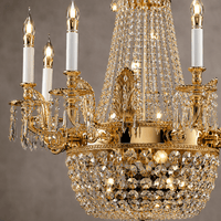 Close-up of Regency Majestic chandelier showing 18K gold-plated copper, candle lights and Asfour crystal