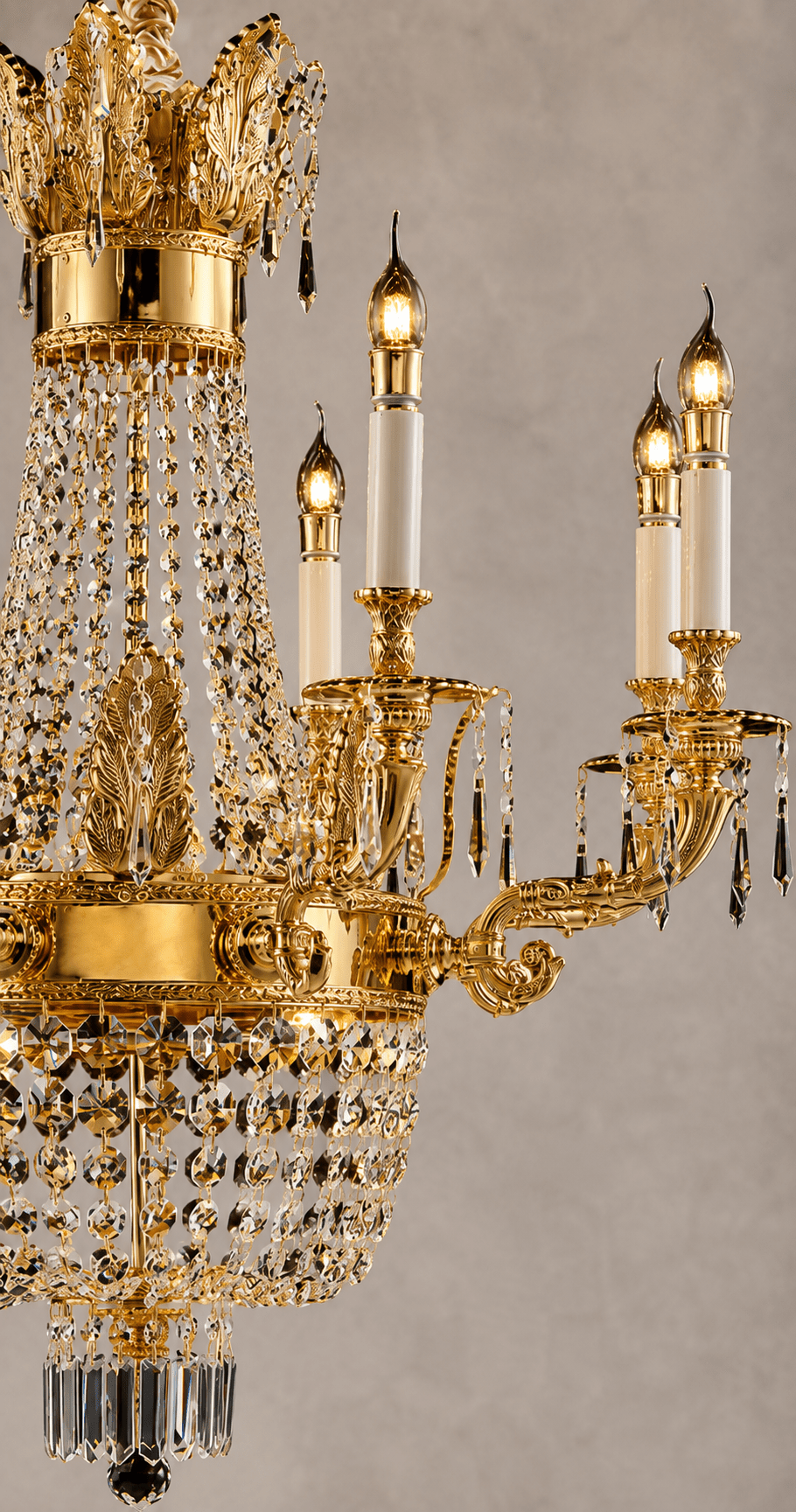 Close-up of Regency Noble gold chandelier with ornate copper arms, candle lights and Asfour crystal.