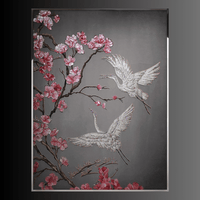 Luxury Swarovski crystal wall art with cranes in flight and pink sakura blossoms on textured background.
