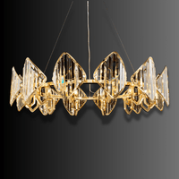 Solaris Altair luxury linear chandelier with prism crystals and gold-plated frame on dark background