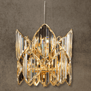 Luxury circular crystal pendant in 18K gold-plated copper with faceted A+ crystals, sculptural and jewel-scale.