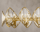 Solaris Cometa luxury crystal linear chandelier in 18K gold-plated finish with faceted architectural crystals