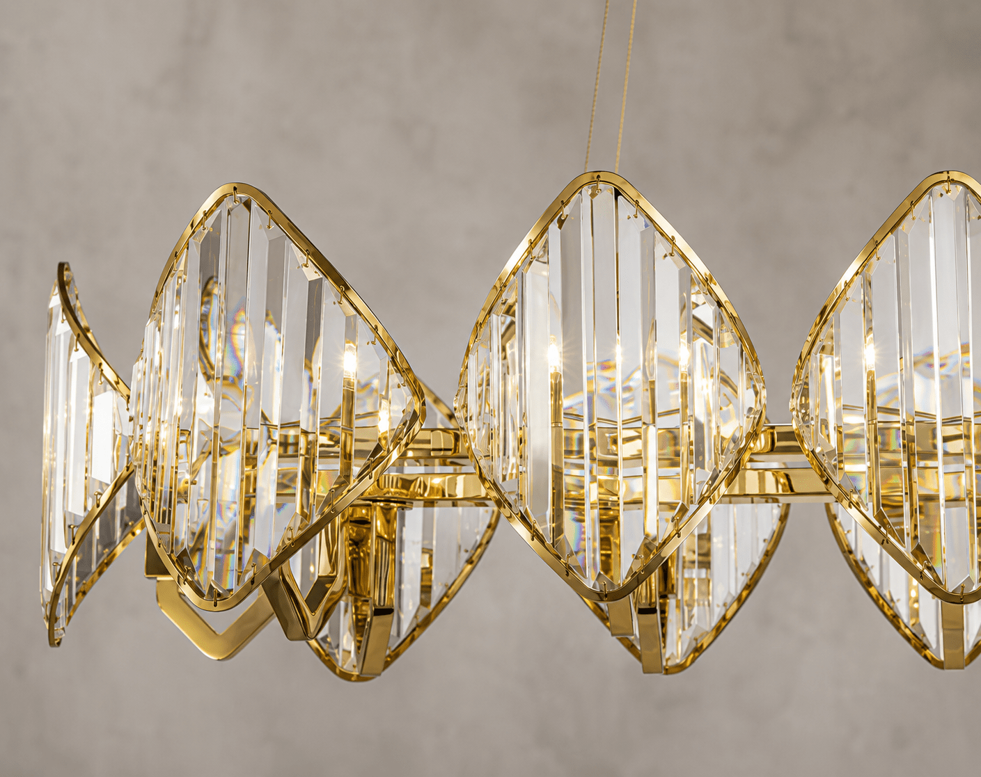 Solaris Cometa luxury crystal linear chandelier in 18K gold-plated finish with faceted architectural crystals