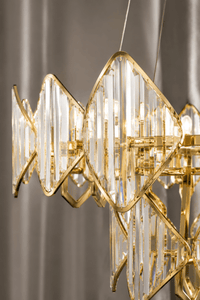 Close-up of Solaris Élite crystal chandelier with 18K gold finish and precision-cut luxury crystals