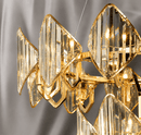 Solaris Iris luxury crystal chandelier close-up with 18K gold frame and precision-cut clear crystal panels