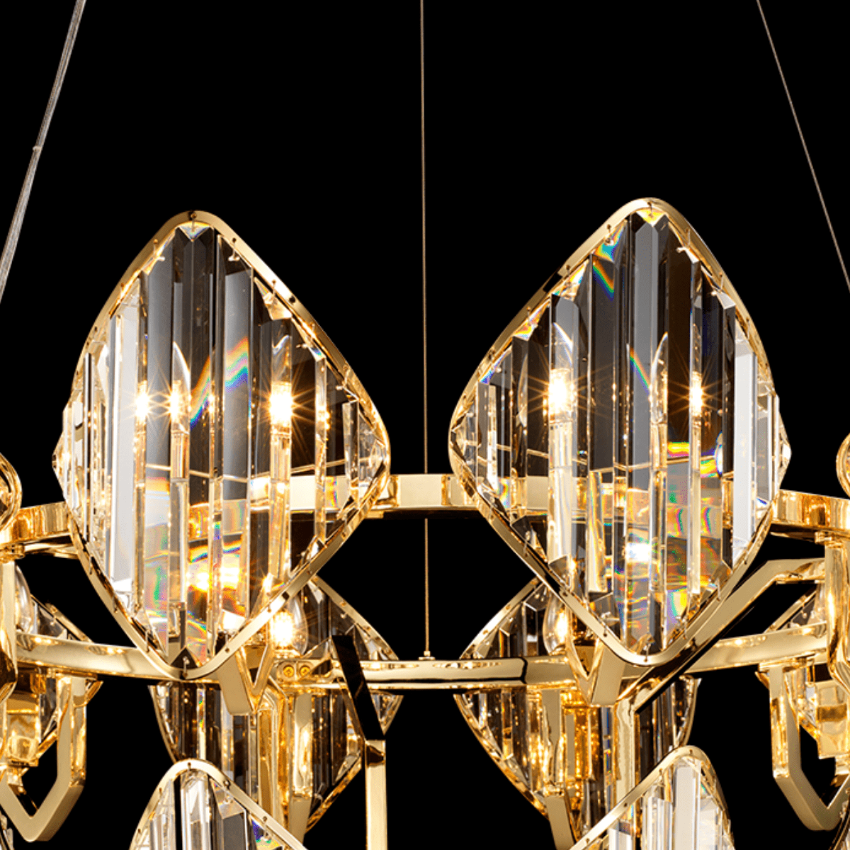 Detail view of Solaris Iris chandelier crystals refracting light through faceted lead-free crystal design