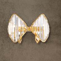 Solaris Vega luxury crystal wall lamp in 18K gold-plated copper with prism-cut crystals, front view