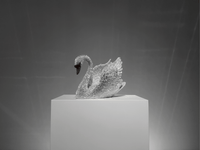 Full view of VAGHAAR Swarovski crystal swan sculpture displayed as luxury centrepiece object.