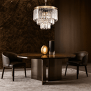 Vendôme Bijou crystal chandelier illuminating a luxury dining or lounge area, ideal for refined boutique settings.