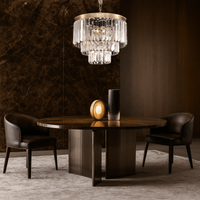 Vendôme Bijou crystal chandelier illuminating a luxury dining or lounge area, ideal for refined boutique settings.