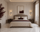 Luxury French-style bedroom featuring Vendôme Boutique crystal wall sconces, white marble flooring, and burgundy accents.