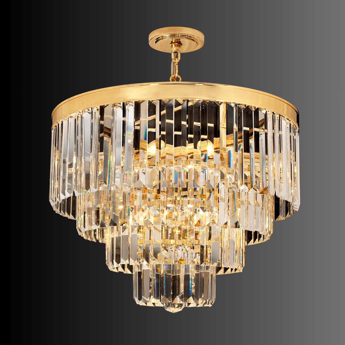 Angled view of the Vendôme Lumière 18K gold crystal chandelier, French-inspired luxury lighting for compact interior spaces.