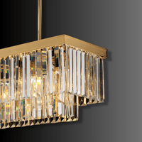 Close-up of Vendôme Prestige crystal chandelier showing precision-cut crystal prisms and gold-plated frame
