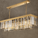 Vendôme Prestige linear crystal chandelier in 18K gold with Asfour prisms, designed for luxury kitchen islands and refined dining interiors.