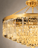 Close up shot of the crystal and gold parts of the Vendôme Royale modern crystal chandelier.