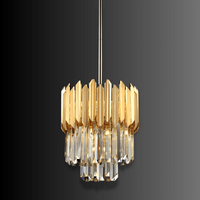 Luxury crystal kitchen island pendant with 24K gold-plated stainless steel and tiered crystal design.