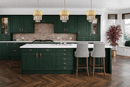 Three luxury crystal pendants installed over kitchen island showing ideal spacing and balanced lighting design.
