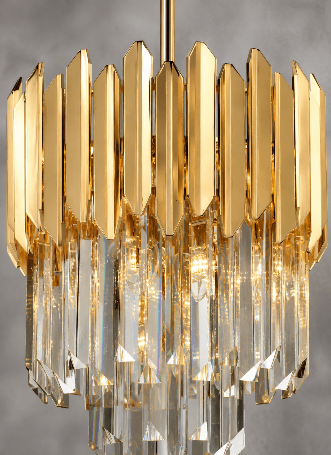 Zarrin Aurelis 24K gold crystal pendant light close-up with precision-cut A+ crystals and luxury architectural finish