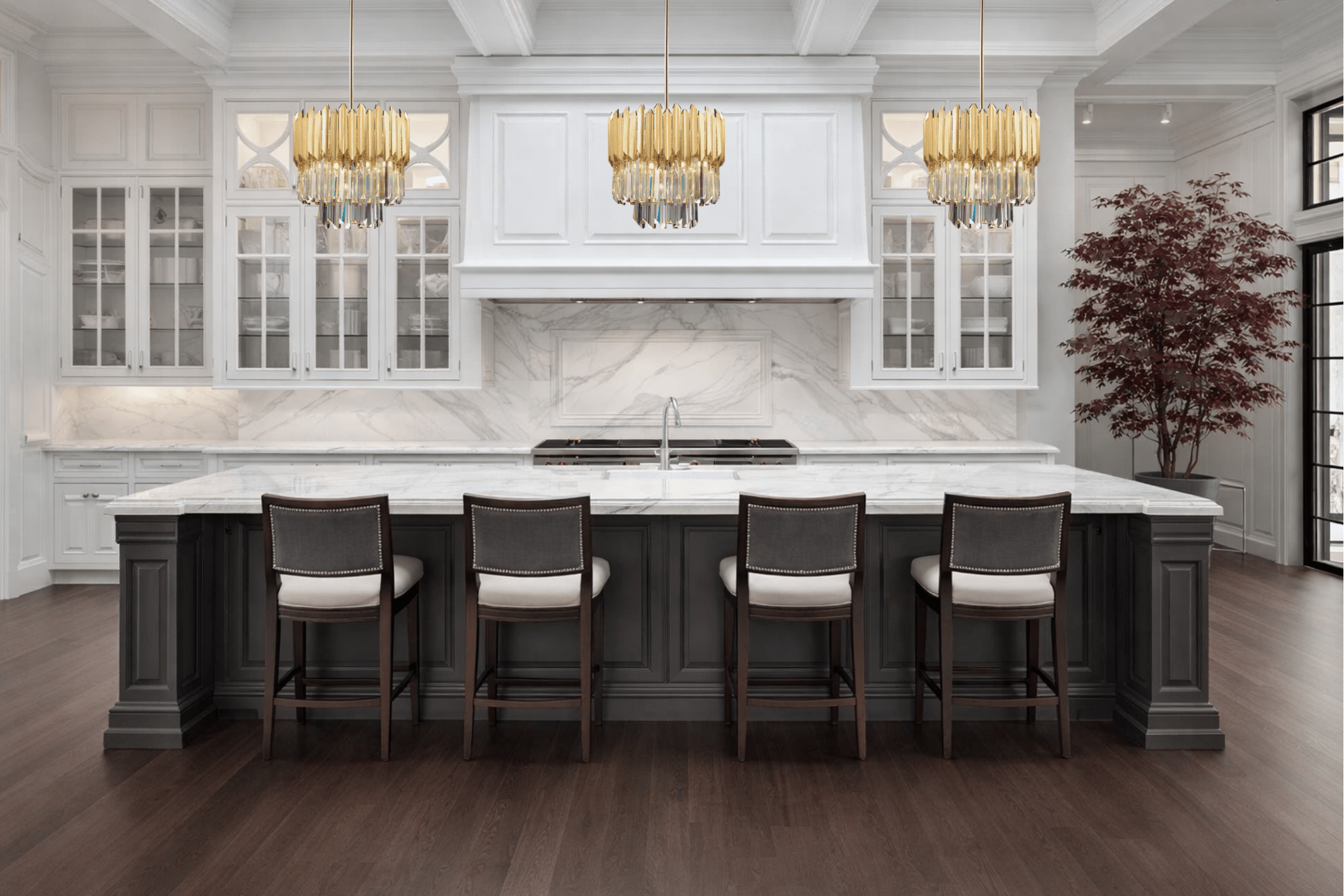 Triple crystal pendants above dark kitchen island in refined architectural interior.