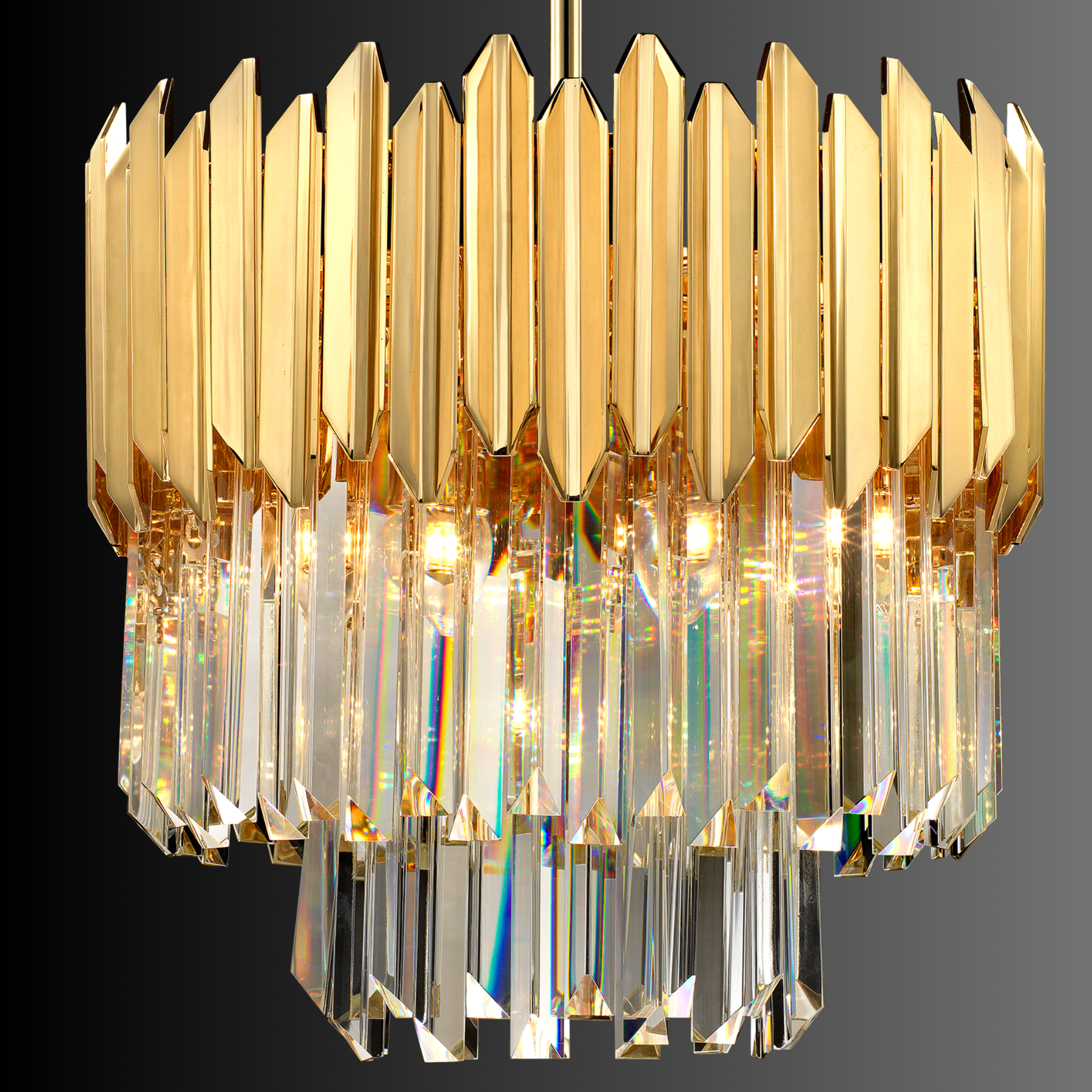 Close-up of faceted crystal prisms and gold frame showing precision-cut crystal detailing.