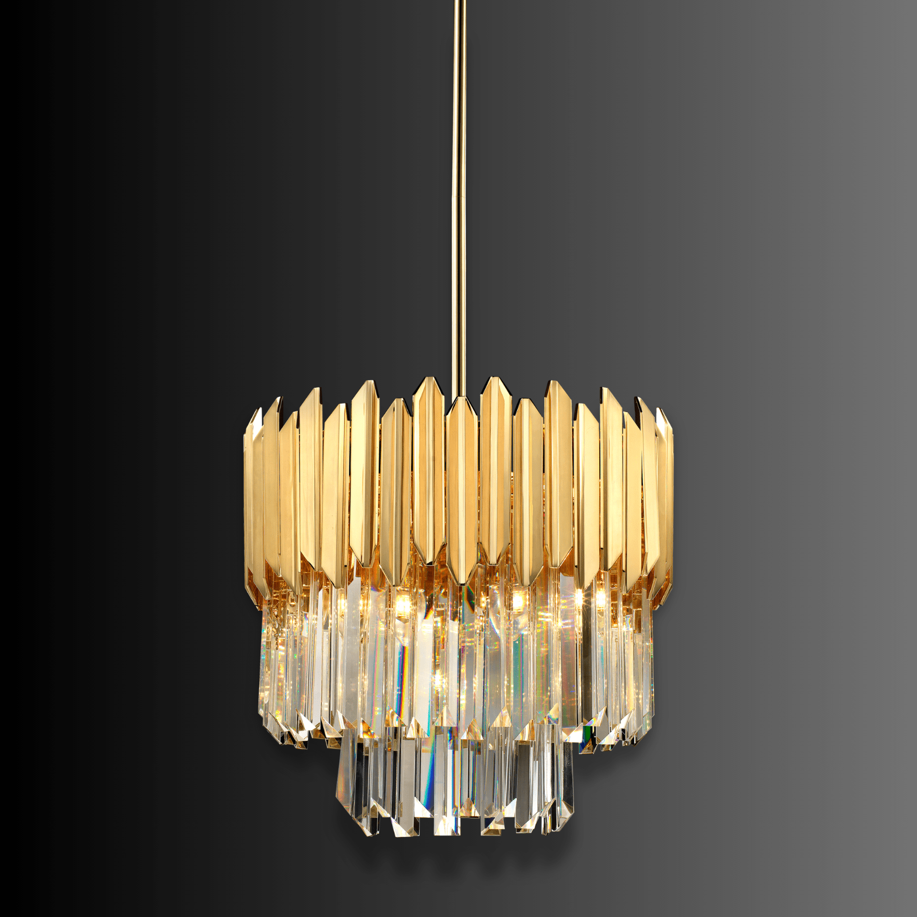 Luxury gold crystal pendant chandelier with faceted crystal tiers and polished gold frame on dark backdrop.