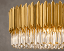 Close-up of Zarrin Halo 24K gold luxury crystal chandelier with precision-cut lead-free crystal details