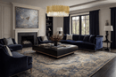 Zarrin Halo chandelier suspended in classic living room with navy seating and architectural fireplace.