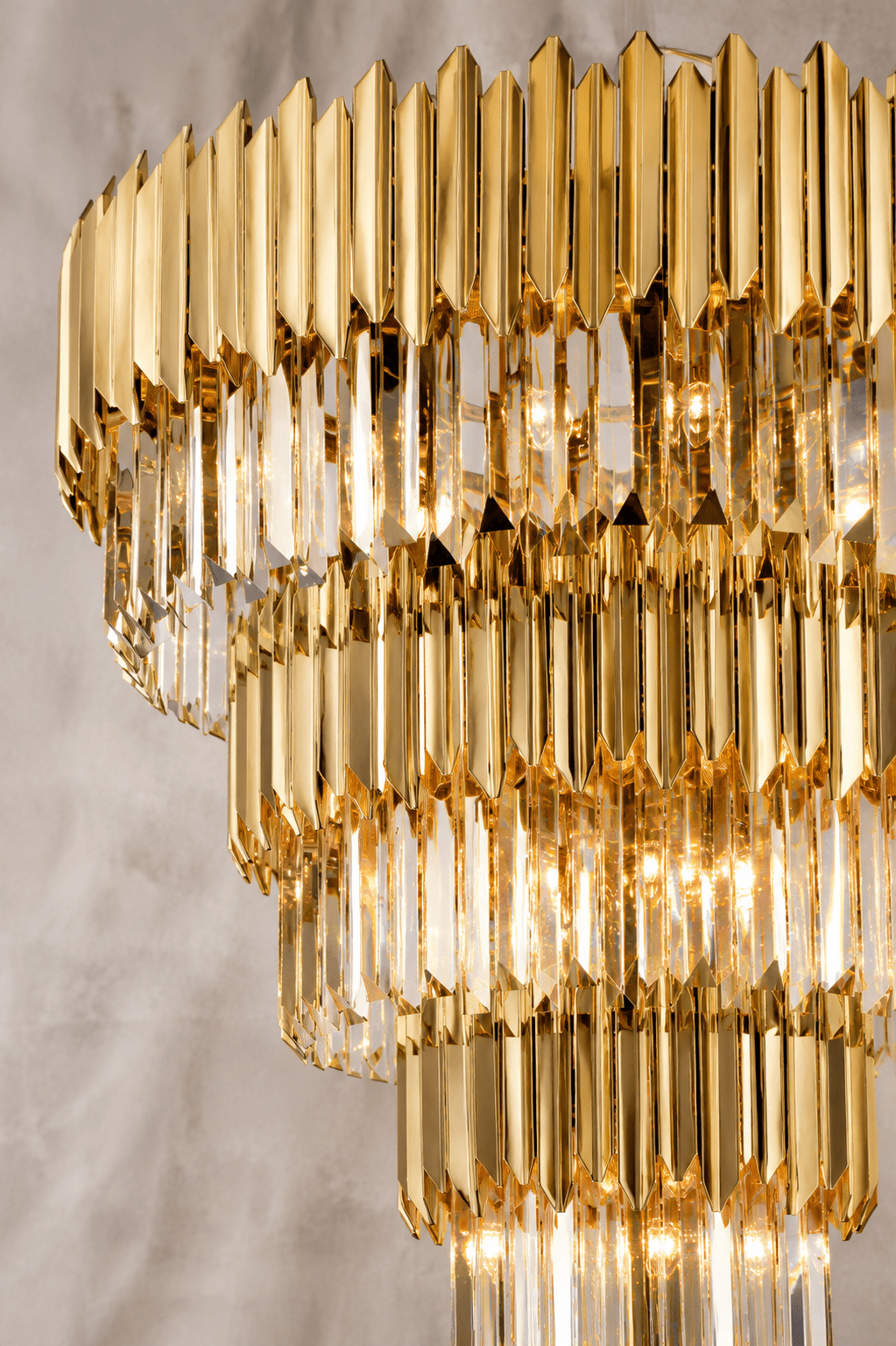 Close-up of Zarrin Lumérion luxury crystal chandelier with 24K gold finish and precision-cut crystal prisms