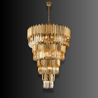 Architectural four-tier crystal chandelier for staircase void and luxury entrance interiors